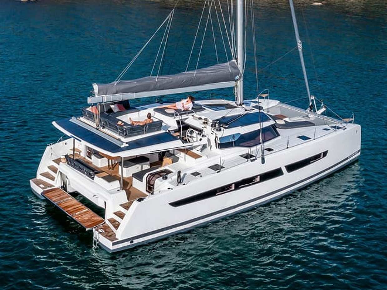 Mykonos: Brand-New Catamaran Cruise with Meal, Drinks & Transport