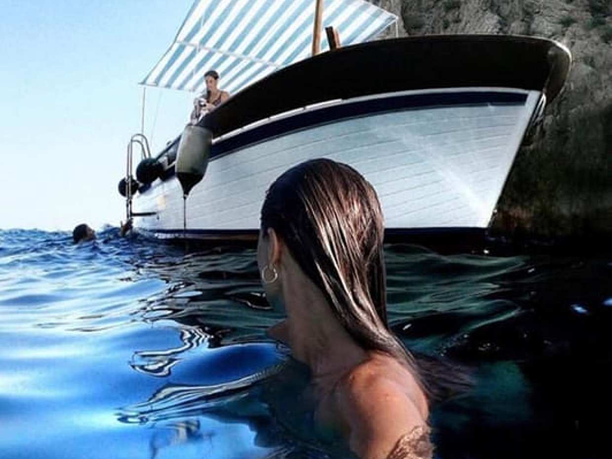 Capri: 2 hour private boat tour, swim, relax & explore hidden gems