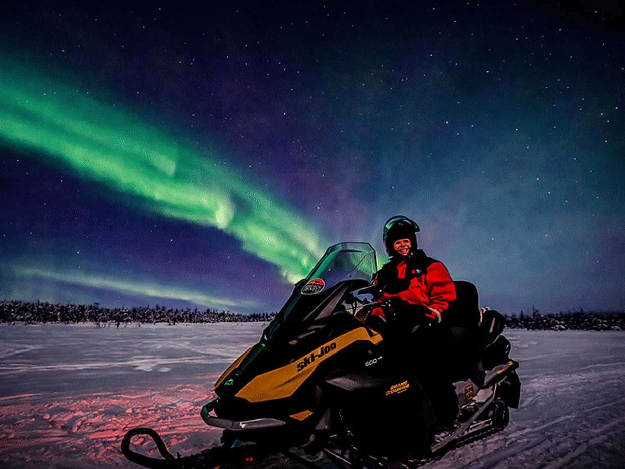 Arctic Night Family Snowmobile Safari with Campfire, Levi