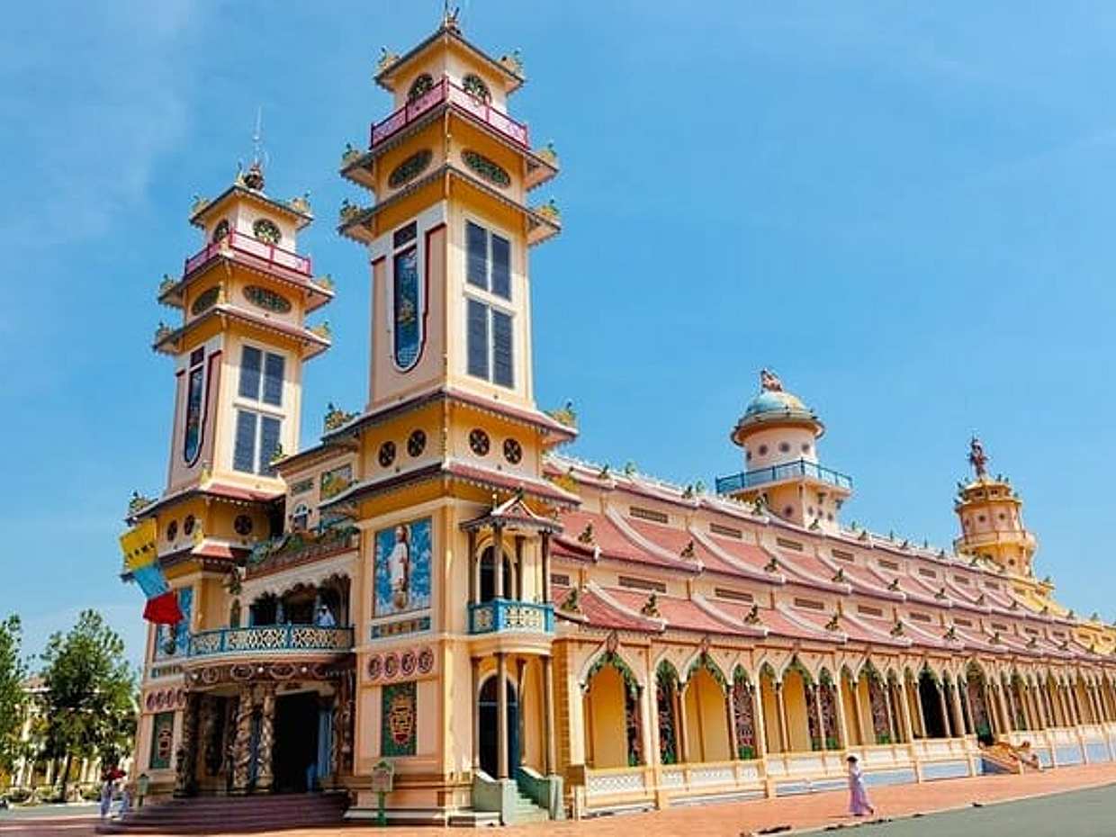 Cu Chi Tunnels, Cao Dai Temple & Moc Bai Border Full-Day Tour in Vietnam, Ho Chi Minh City, photo 3