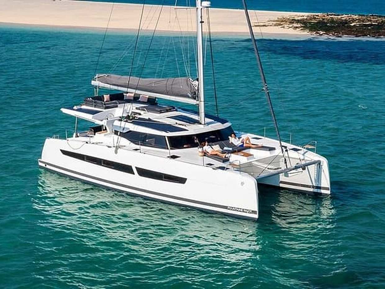 Mykonos: Luxury Catamaran Cruise with Meal, Drinks & Transport