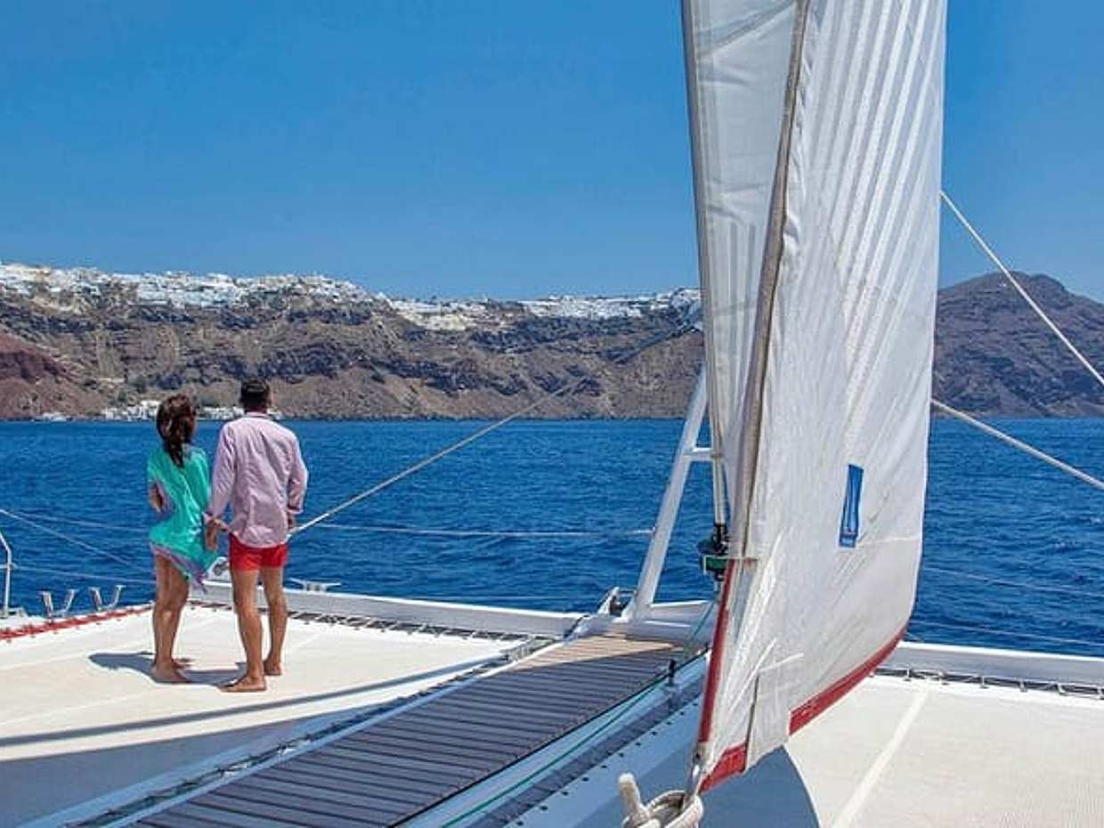 Santorini Cruise on Catamaran with BBQ & Open Bar