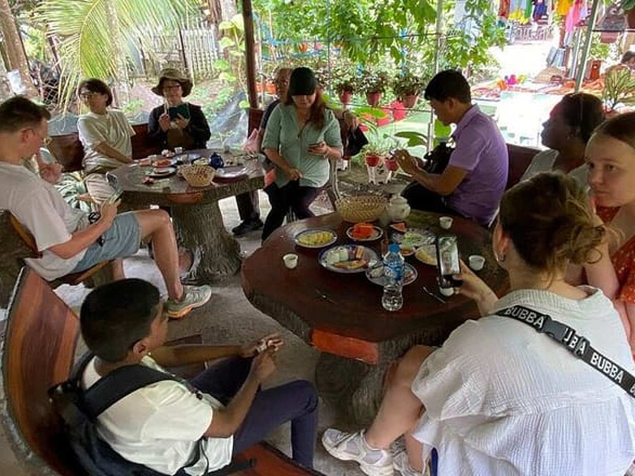 Full Day Mekong Delta with Honey Farm And Coconut Candy Shop Tour in Vietnam, Ho Chi Minh City, photo 3