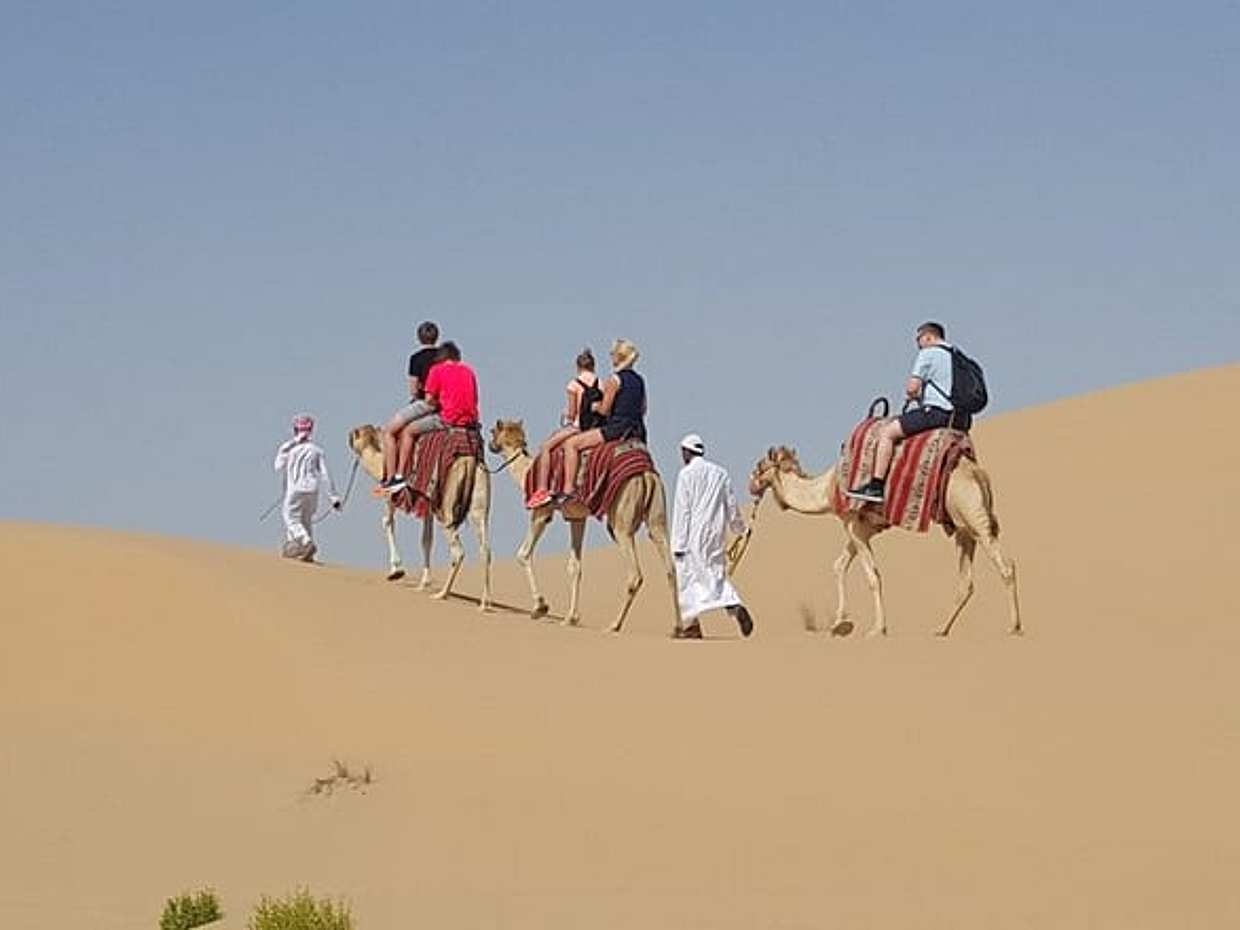 Abu Dhabi Desert safari with BBQ Dinner,Sandboarding & Camel ride, photo 2