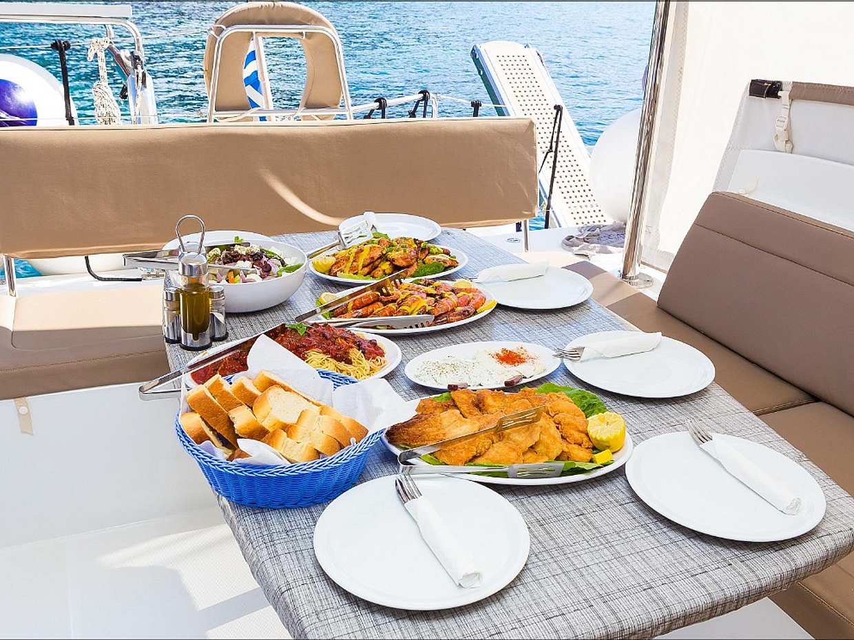 Luxury Sailing Catamaran Daytime Cruise with BBQ & Cocktails in Greece, Santorini, photo 4