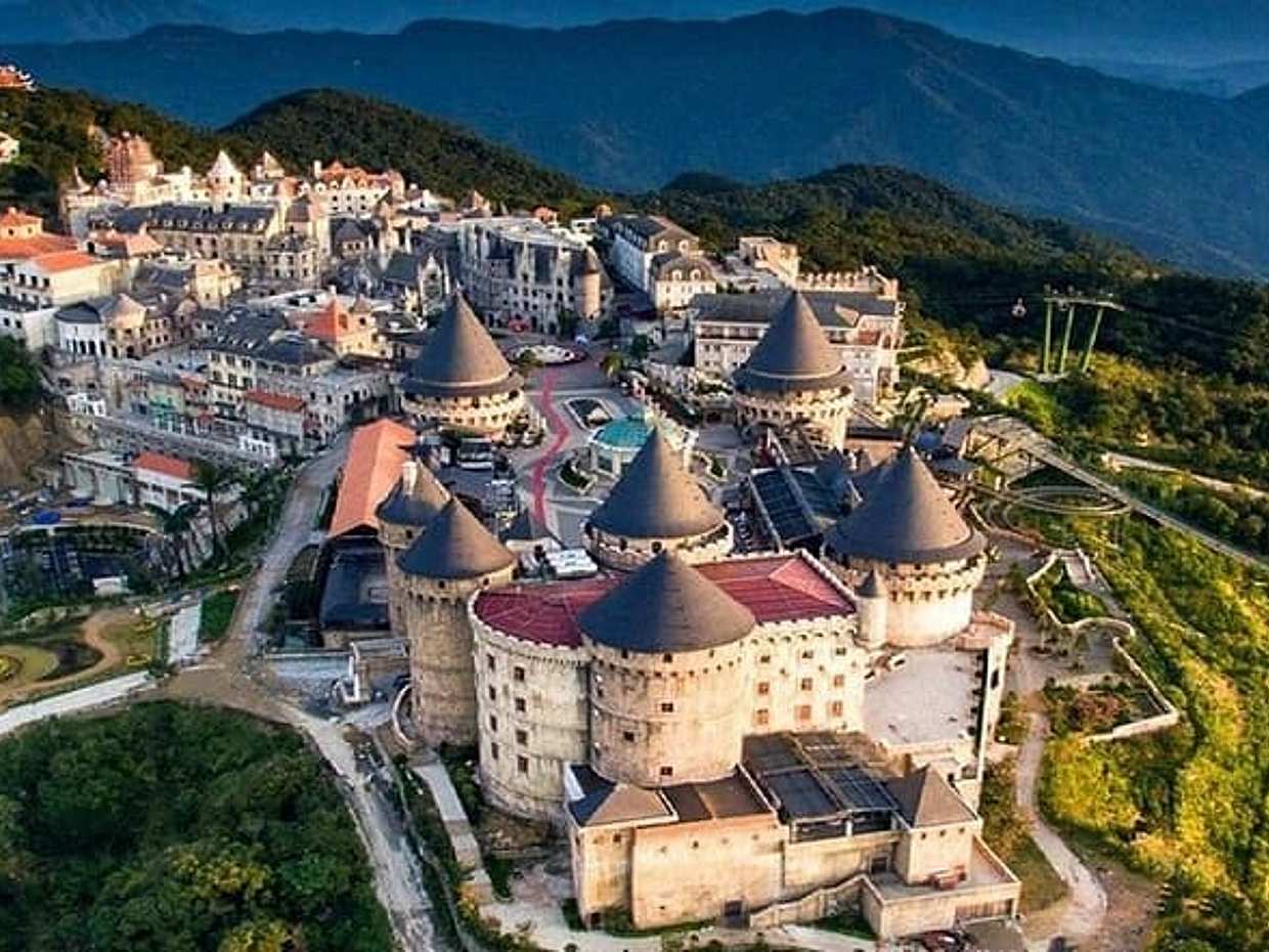 Ba Na Hills Sunset Tour with Golden Bridge & Night Dragon Bridge in Vietnam, Da Nang, photo 4