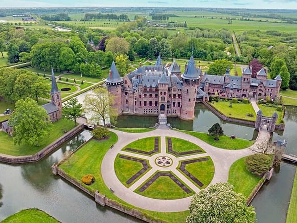 Privétransfer: Amsterdam>Rotterdam, 2 uur stop bij Kasteel De Haar in Nederland