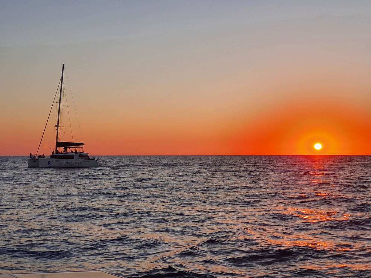 Santorini Classic Sunset Catamaran Cruise with BBQ, Drinks & Transfers in Greece