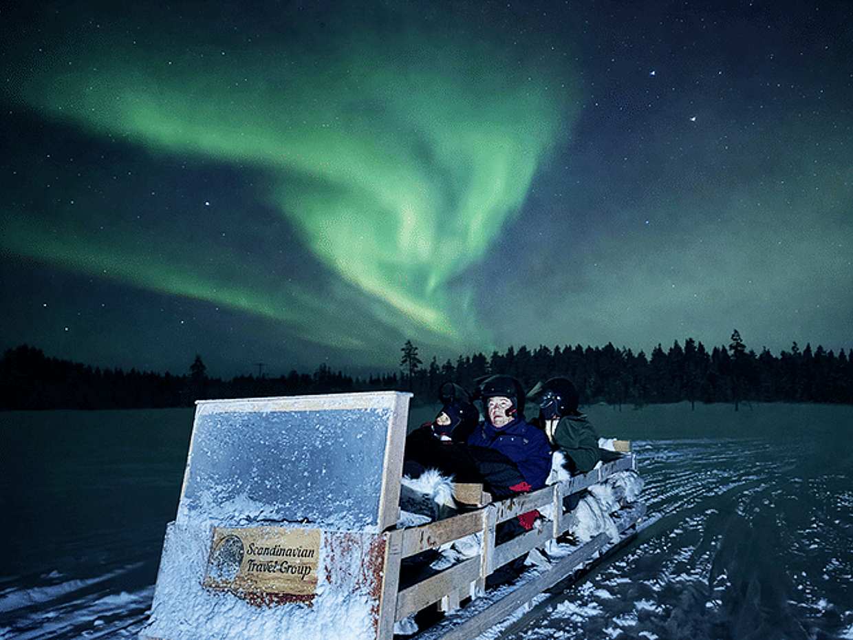 Arctic Night Snowmobile Sled Ride with Campfire, Levi