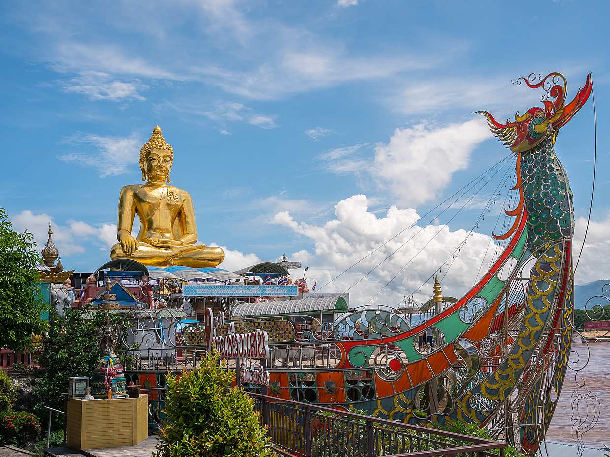 Chiang Mai: One-day Tour with White Temple, Baan Dam Museum, Blue Temple, Golden Triangle, Boat Trip and Karen Village. in Thailand