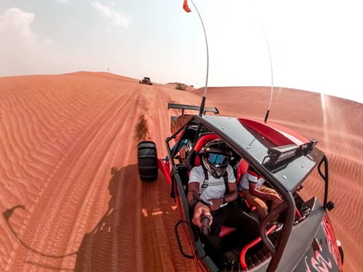 Dubai Desert Buggy Driving Experience with Dune Bashing & Camel Ride
