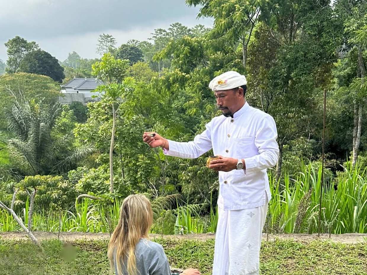Sacred Bali Purification: Spiritual Journey with Mangku Jati in Indonesia