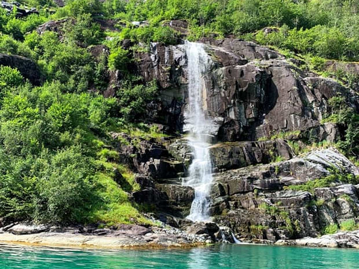 Fyksesund with waterfall private yacht cruise from Norheimsund, refreshments included