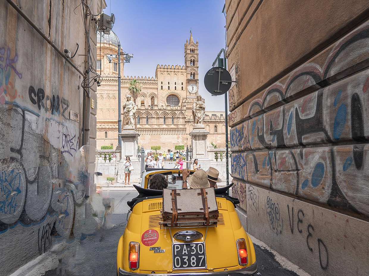 An iconic vintage Fiat 500 driving around Palermo in Italy, photo 4
