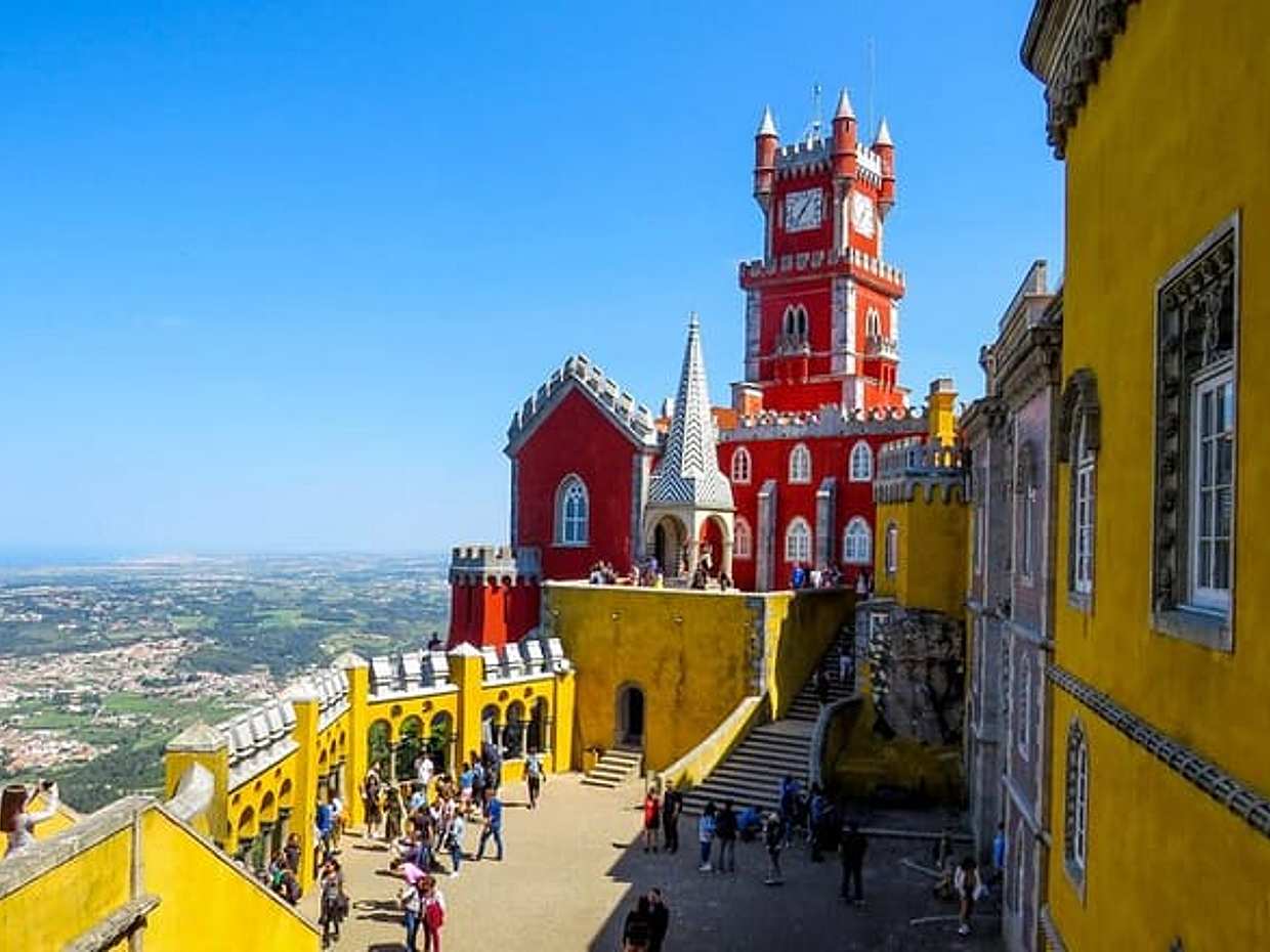 Sintra, Pena Palace, Quinta da Regaleira & Cascais Group Tour in Portugal, Lisbon