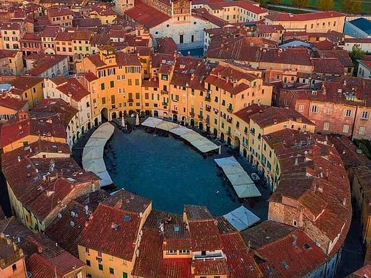 Discover Lucca and Pisa and Enjoy Buccellato Cake: Full Day Tour