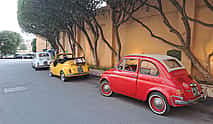 Photo 3 An iconic vintage Fiat 500 driving around Palermo