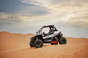 Photo 1 Dubai: 30 Mins Dune Buggy Safari Tour in Red Dunes with BBQ Dinner