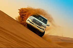 Photo 1 Red Dune Desert Safari with Camel Ride