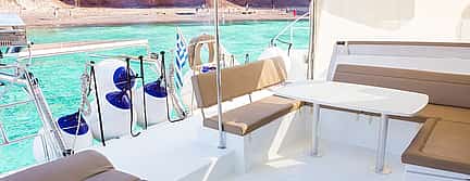 Foto 3 Private Sailing Catamaran Daytime Cruise with BBQ & Drinks