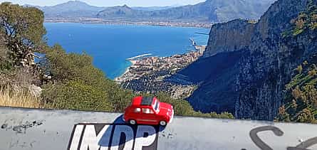 Photo 2 An iconic vintage Fiat 500 driving around Palermo