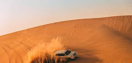 Photo 2 Abu Dhabi: 6-hour Desert Safari with BBQ, Camel Ride & Sandboarding