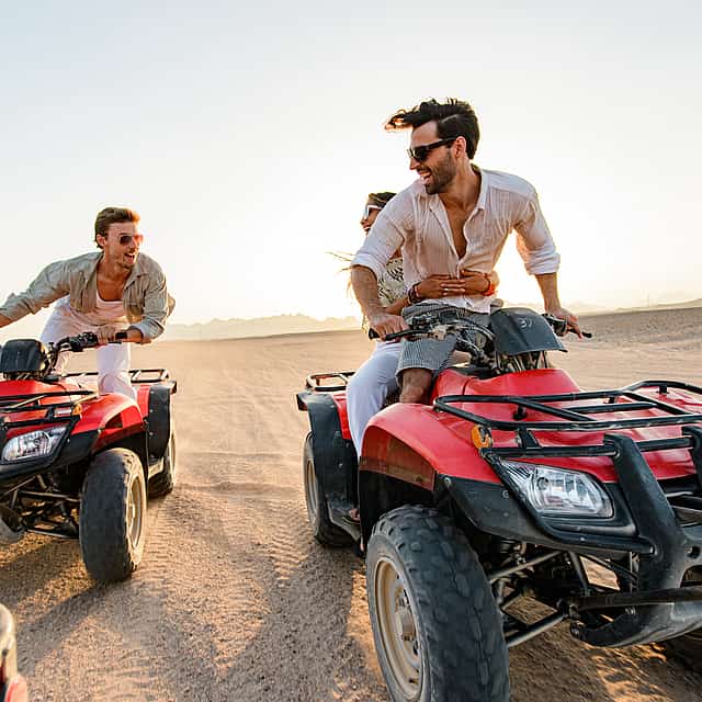 Dubai: Desert Safari, Quad bike and Sand boarding with BBQ Dinner in Premium Camp