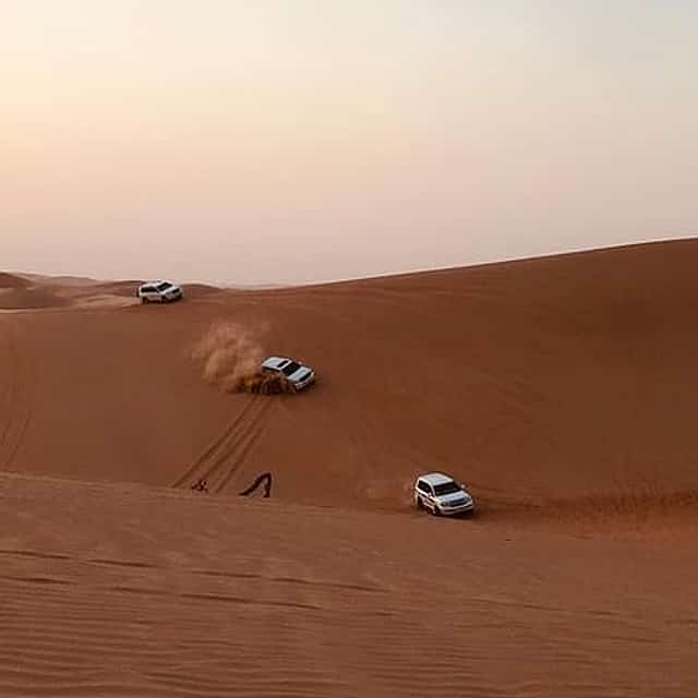 Abu Dhabi Desert safari with BBQ Dinner,Sandboarding & Camel ride