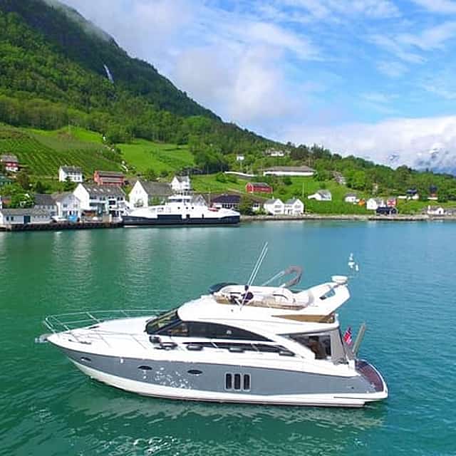Bergen to Hardangerfjord VIP car + private yacht Fjord cruise