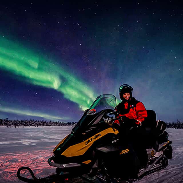 Arctic Night Family Snowmobile Safari with Campfire, Levi