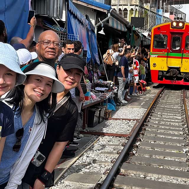 Floating and Railway Market, and Erawan Waterfall from Bangkok (Group Tour)