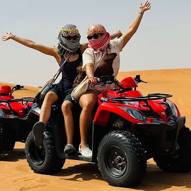 Quad Bike, Camel Ride, and Sandboarding Experience