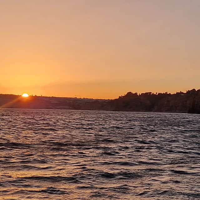 Golden Hour on Elegant Yacht: Sunset Tour in Lagos, Algarve