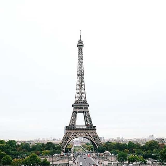 Eiffel Tower Summit with Hotel Pickup & Belleville walking tour
