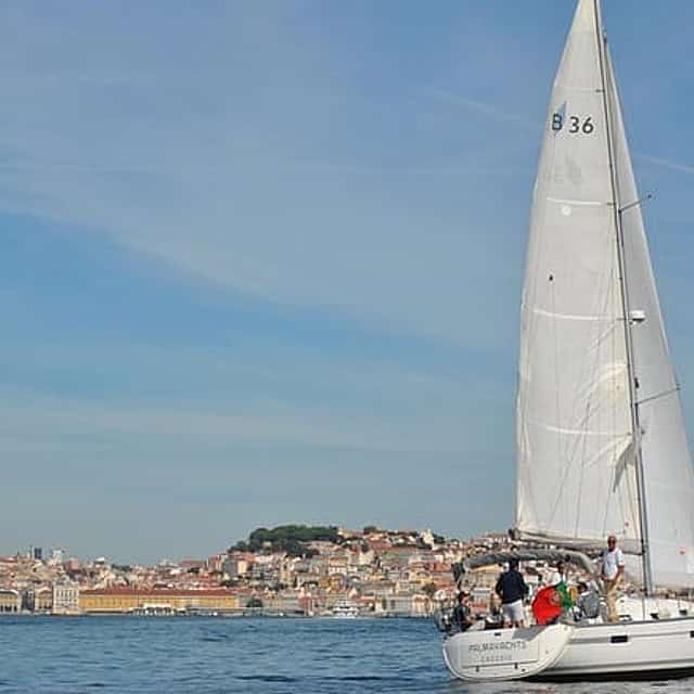 Lisbon Old town Sailng Cruise- 2h Small Group Tour, with a drink included