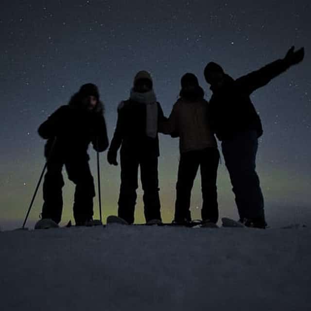 Snowshoeing Under the Auroras