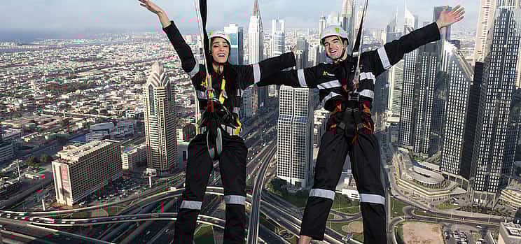 Photo 1 Dubai Desert Safari with BBQ Dinner & Sky Views Edge Walk tour