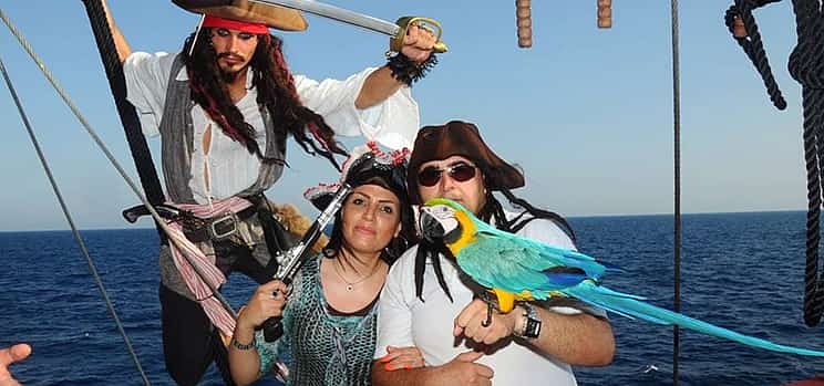 Фото 1 Экскурсия на пиратской лодке в Алании с трансфером в обе стороны, обедом барбекю и безалкогольными напитками