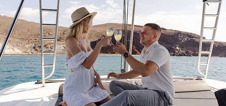 Photo 1 Premium Sunset Sailing Catamaran Experience with BBQ and Drinks