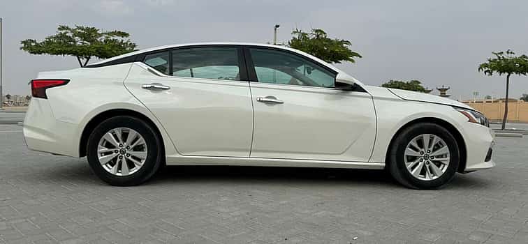 Photo 1 Sharjah Airport (SHJ) to Abu Dhabi City Transfers in Sedan Car